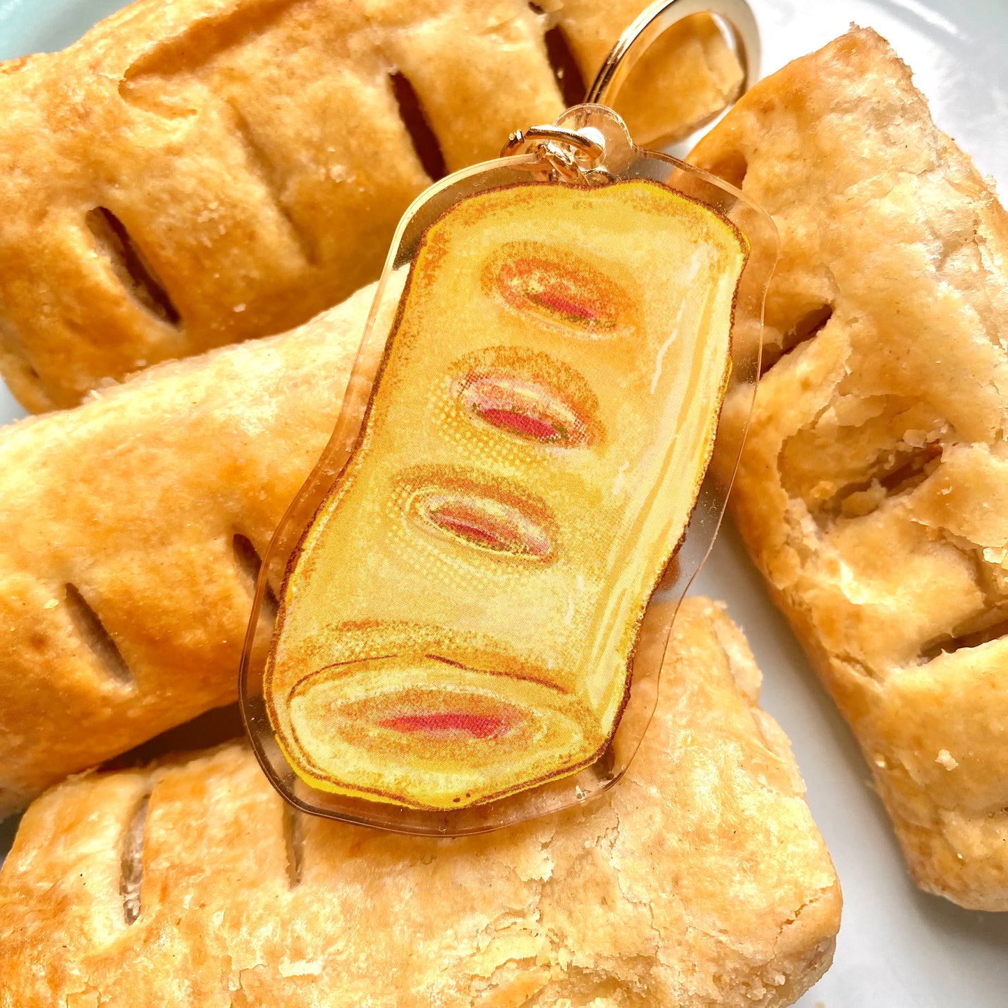 delicious sausage roll keyring