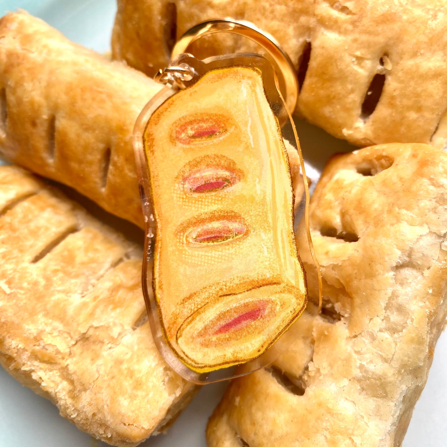 delicious sausage roll keyring